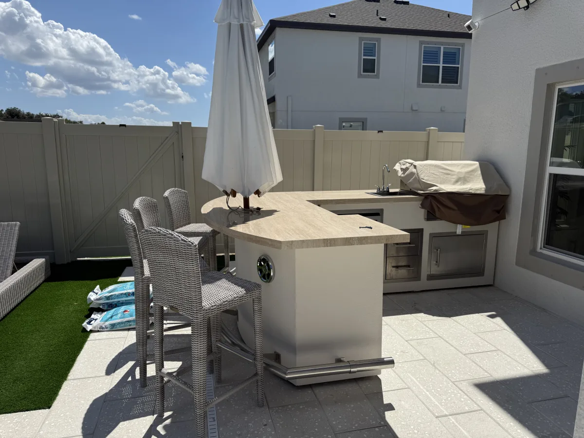Finished outdoor kitchen with umbrella and paver patio, Trinity FL